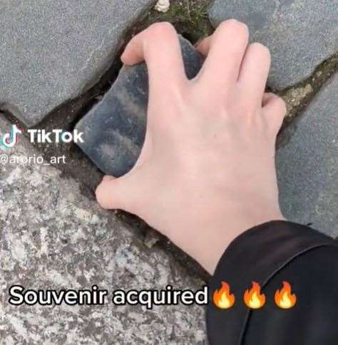 The stone being removed near Canterbury Cathedral. Picture: @arorio_art via TikTok