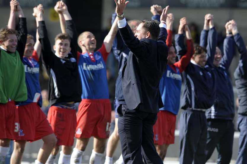 Manager Martin Allen celebrates the League 2 title with his players. Picture: Barry Goodwin
