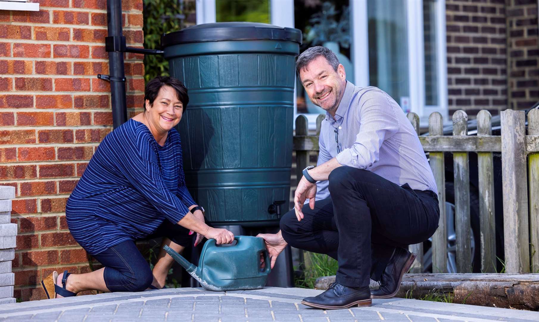 Southern Water CEO Lawrence Gosden and Whitstable resident Jackie Kohler following the installation of a water butt pilot in Whitstable.