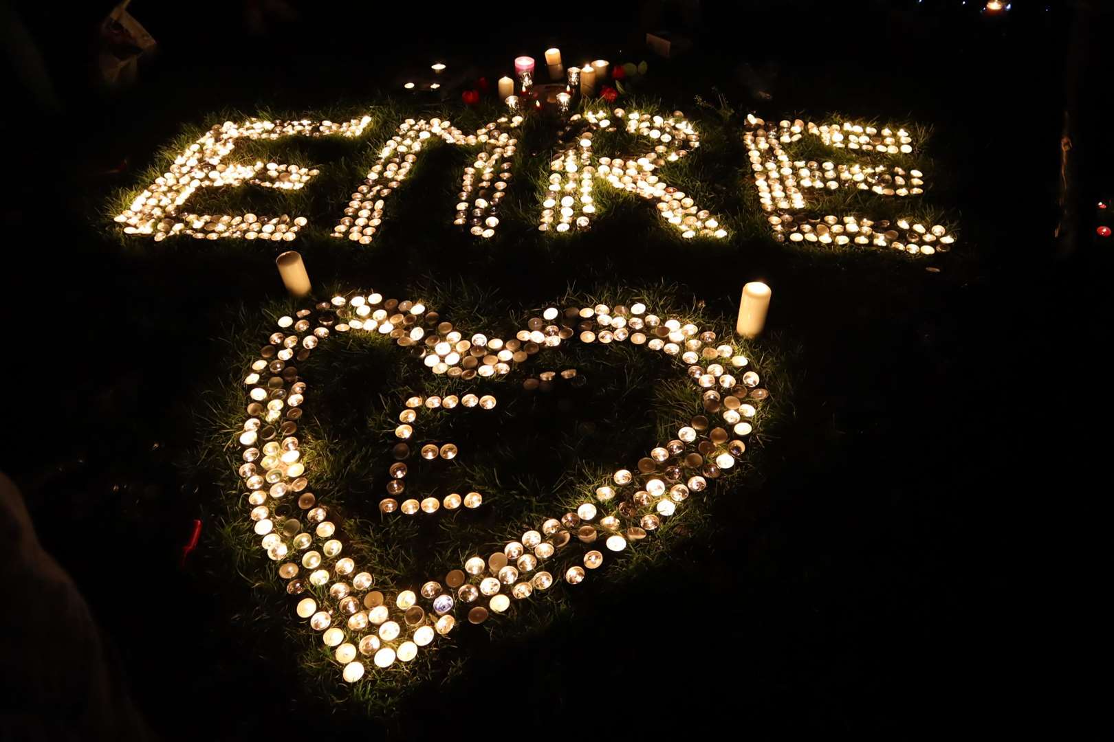 Emre Huseyin's name in lights at candlelit vigil in New Road playing fields, Sheerness, on Thursday. It would have been his 16th birthday