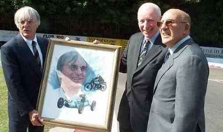 HOUSEHOLD NAMES: Bernie Ecclestone with John Surtees and Sir Stirling Moss and the picture of himself presented to mark the opening of the clubhouse