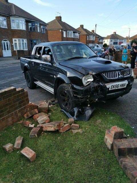 Pensioner Michael Gilbert had a lucky escape when this Mitsubishi pick-up truck crashed through his brick wall in St Helen's Road, Sheerness. Picture: Michael Gilbert