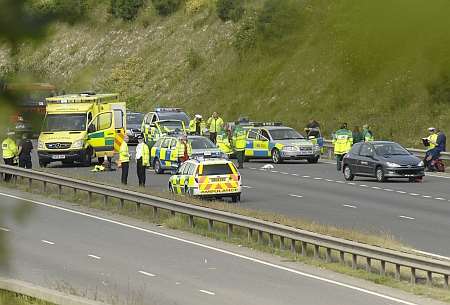 Emergency services at the scene of the crash on the A249. Picture: Barry Crayford