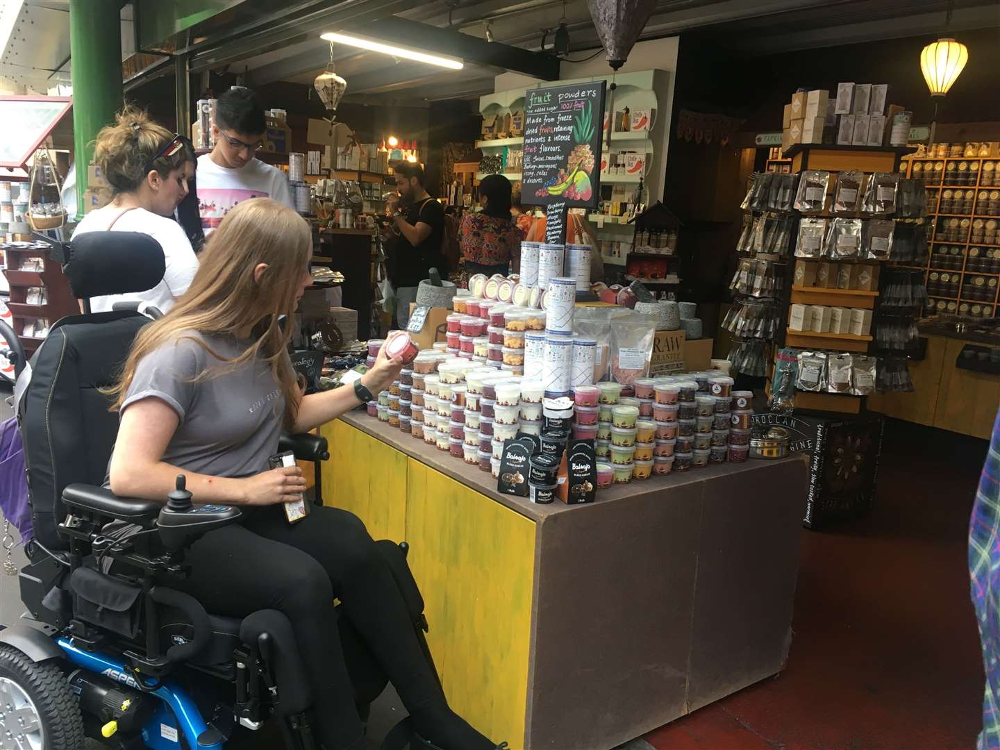 Hannah Bullard using her wheelchair at Borough Market where she bought spices for one of her food blog recipes