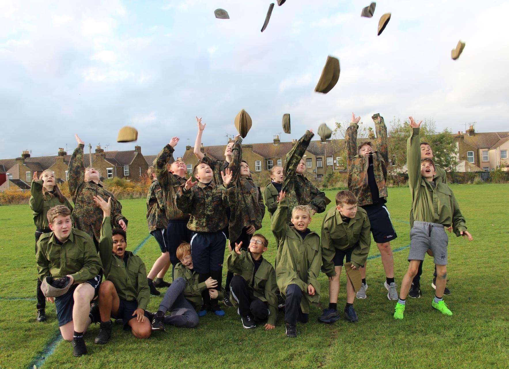 Hats off: Students from Sheppey's Oasis Academy recreated the 1914 Christmas Day truce football match in Sheerness (5324696)