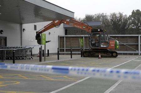 A digger is abandoned at Waitrose in Ashford after a ram raid