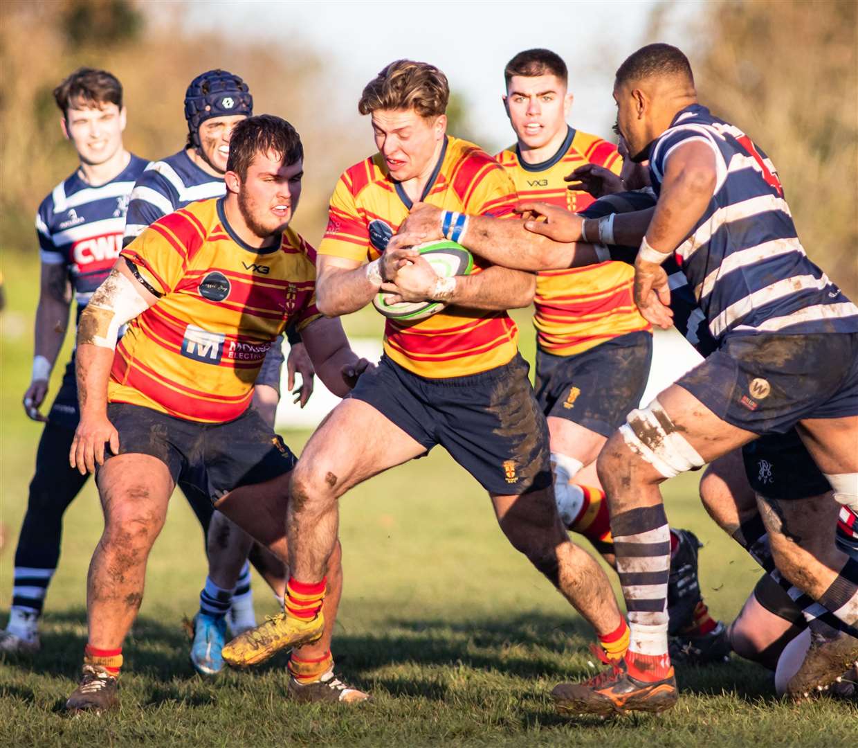 Medway's Alfie Orris on the ball against Westcombe Park as teammates Maik Timmerman, left, and Max Bullock, behind, watch on. Picture: Jake Miles Sports Photography