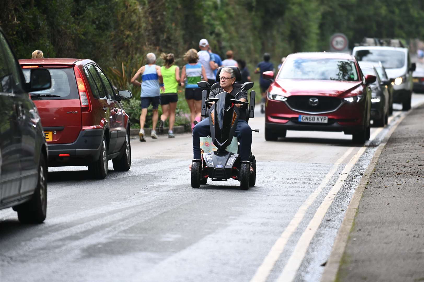 Runners had to contend with different forms of transport on parts of the route! Picture: Barry Goodwin (49789990)