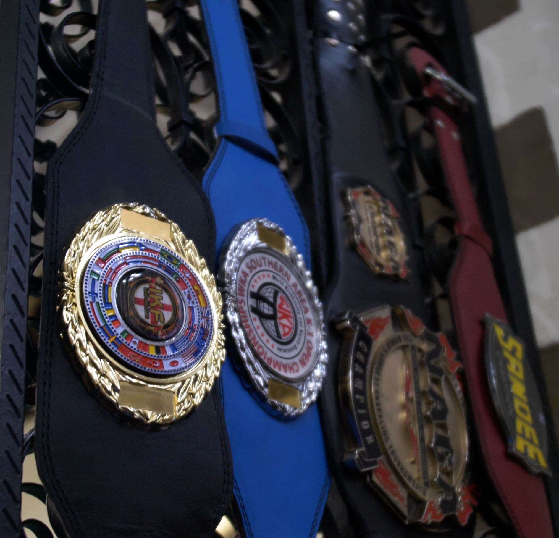 Championship belts at Granite Gym in Chatham