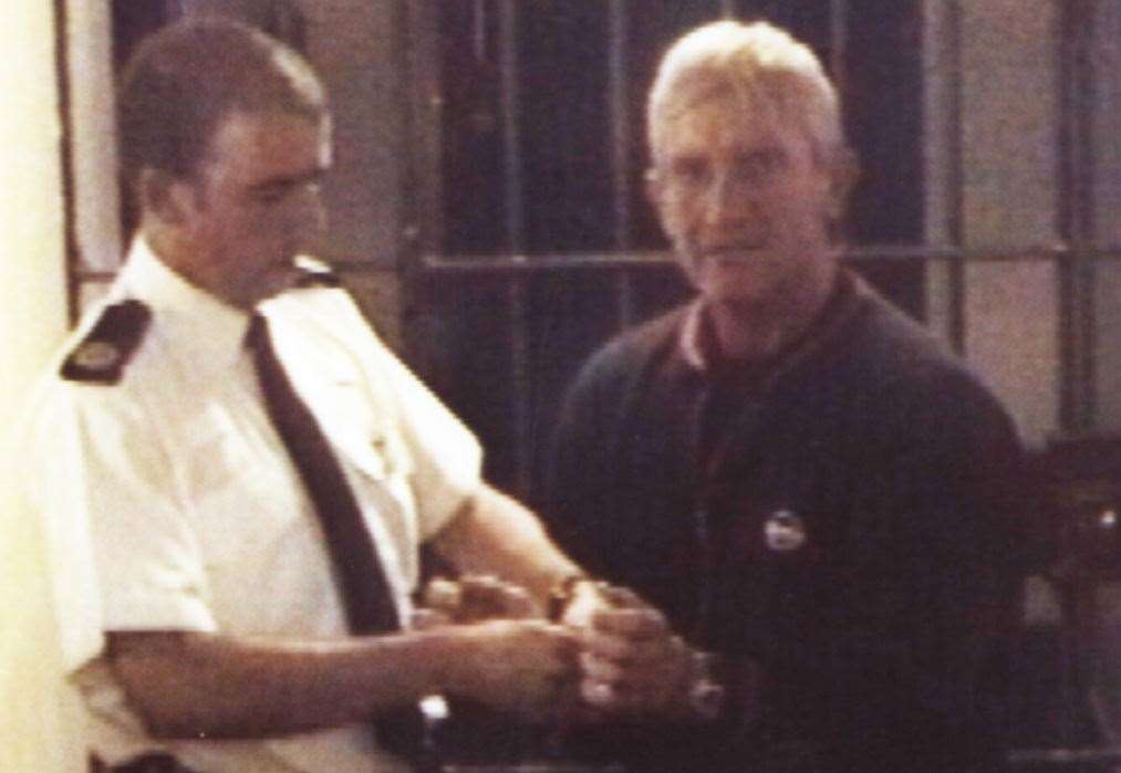 Kenneth Noye arrives in Dartford police station for the murder of Stephen Cameron. He had jetted back into the UK by landing at Manston Airport following his capture in Spain. Picture: Kent Police