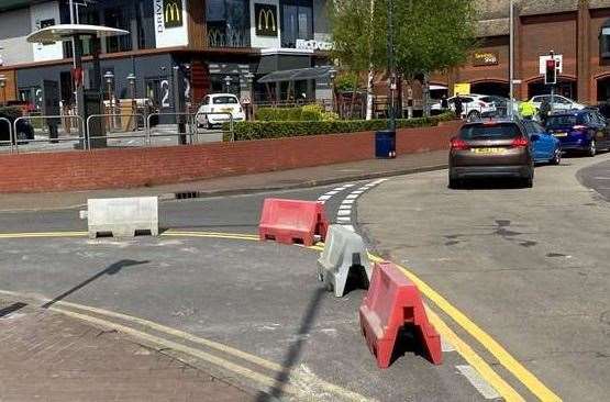 The red and white plastic bollards have been criticised