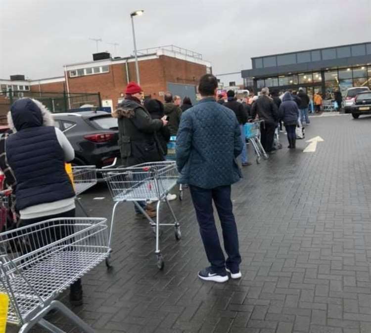 By the beginning of March, people began arriving early and queuing outside the county's supermarkets to get their hands on goods before the shelves emptied, amid reports of shoppers panic-buying items such as toilet rolls, pasta, long-life milk and soap. This picture outside Aldi in Strood was typical of scenes across Kent. Picture: Julie Ali via Facebook.