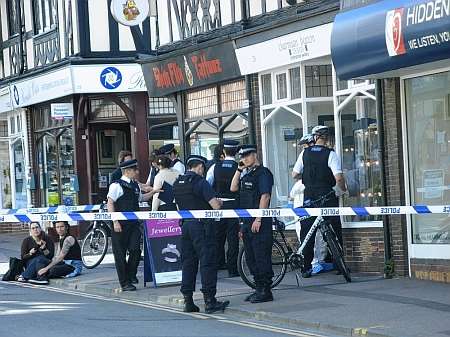 Police at the scene of a raid on Charmian Beaton jewellery shop in Maidstone.