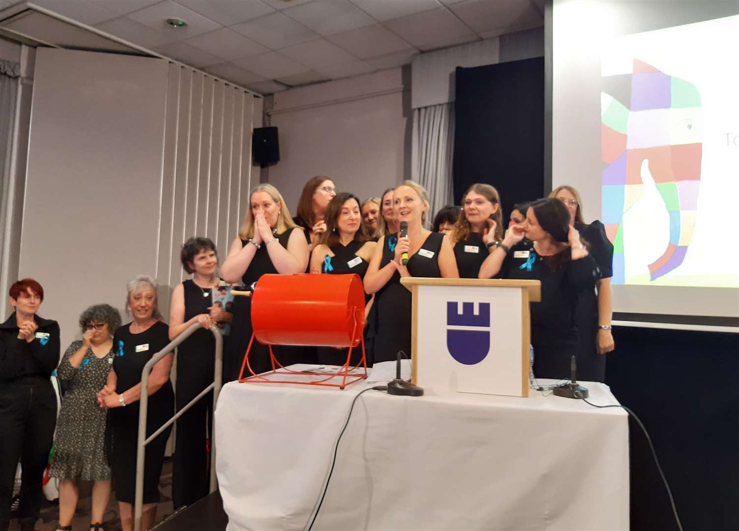 The hospice team find out more than £300,000 was raised