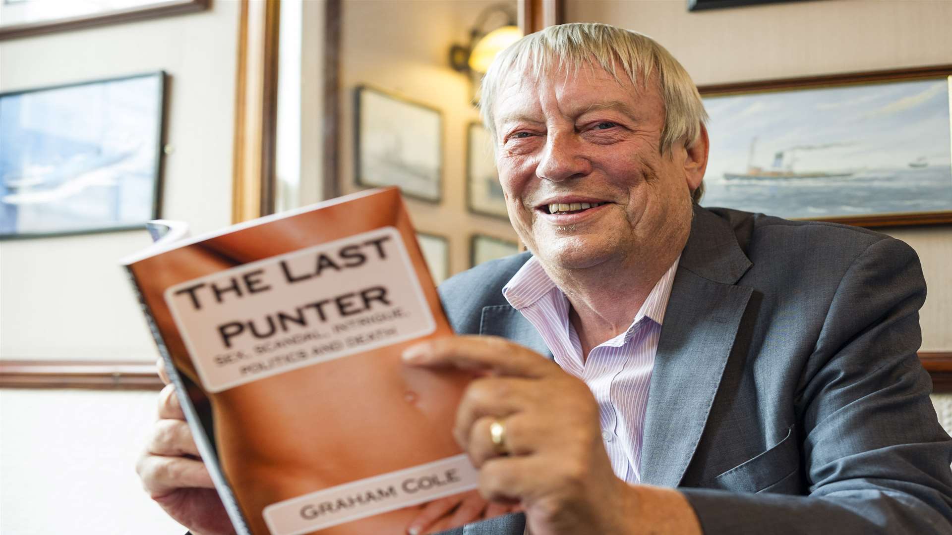 Graham Cole with his book