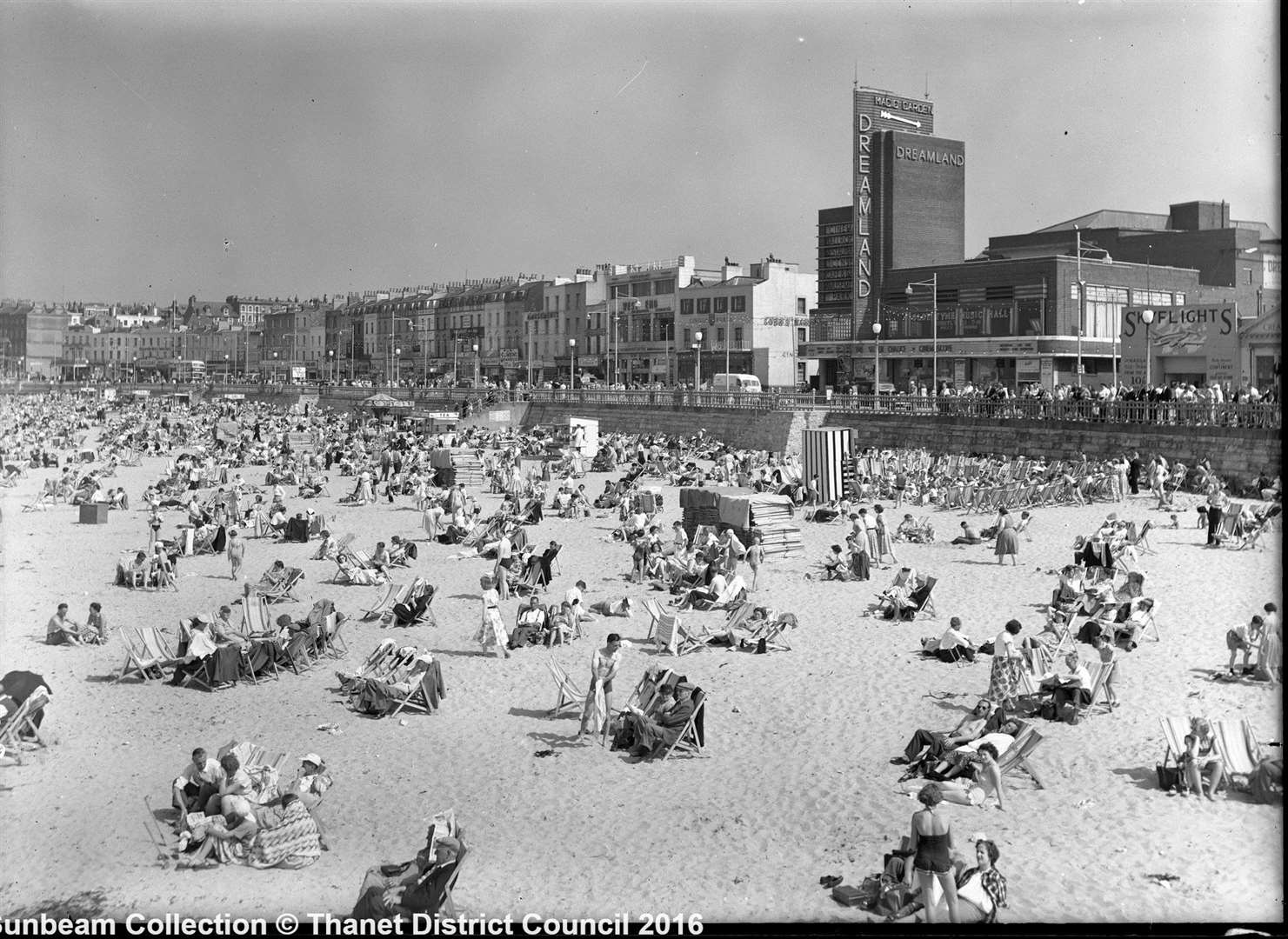 A packed Margate beach with Dreamland in the background. Date unknown. Picture: Thanet council