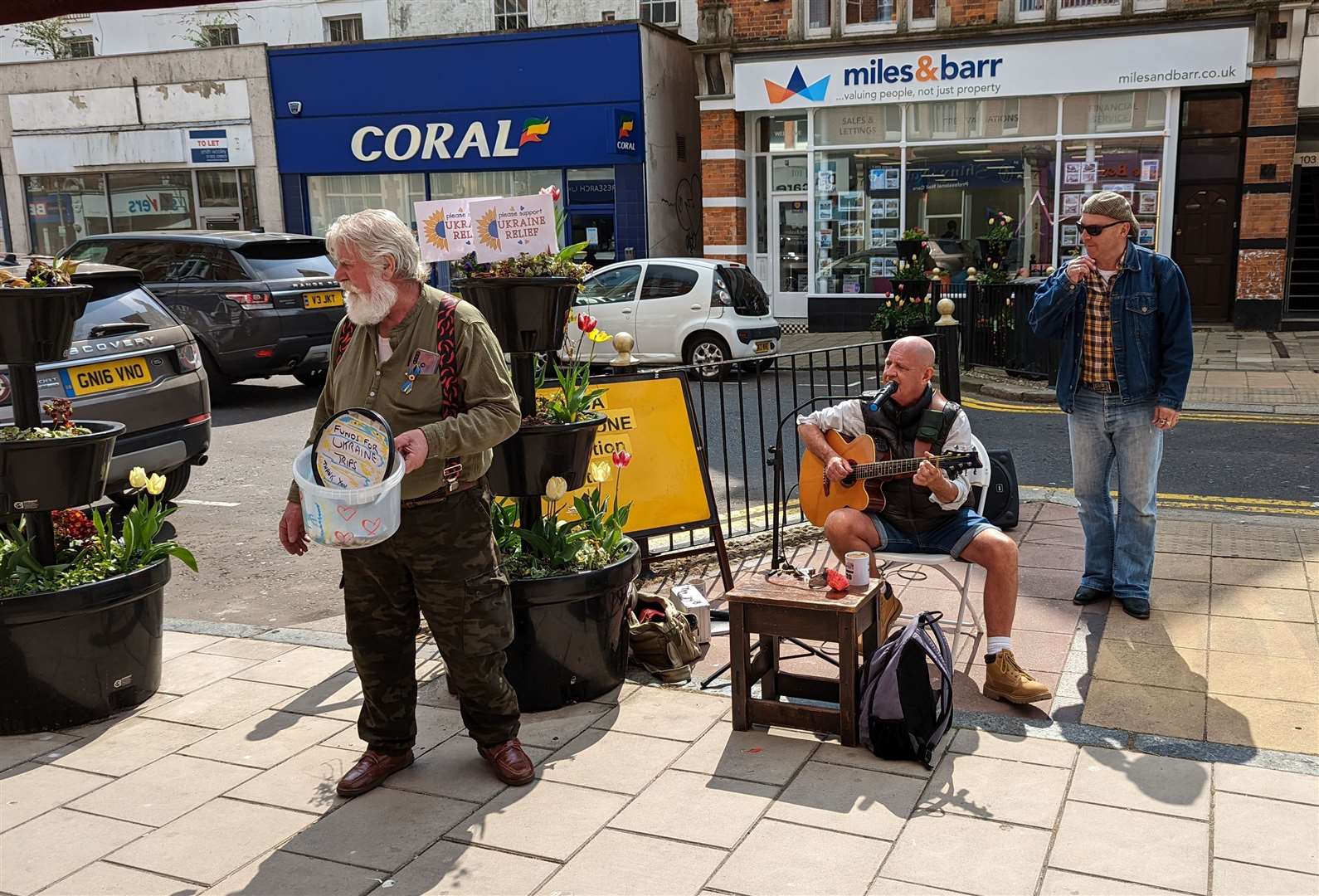 Local musician Brian Hoyle (left) performing with friends outside The Chambers in Folkestone