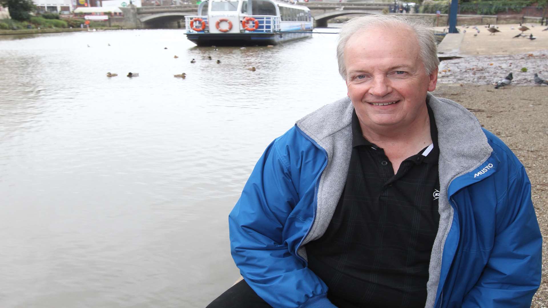 Dave Grant at the water edge, where he dived in to save a man who fell in