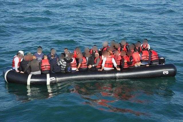 People being trafficked into the country in a small boat. Pic: NCA