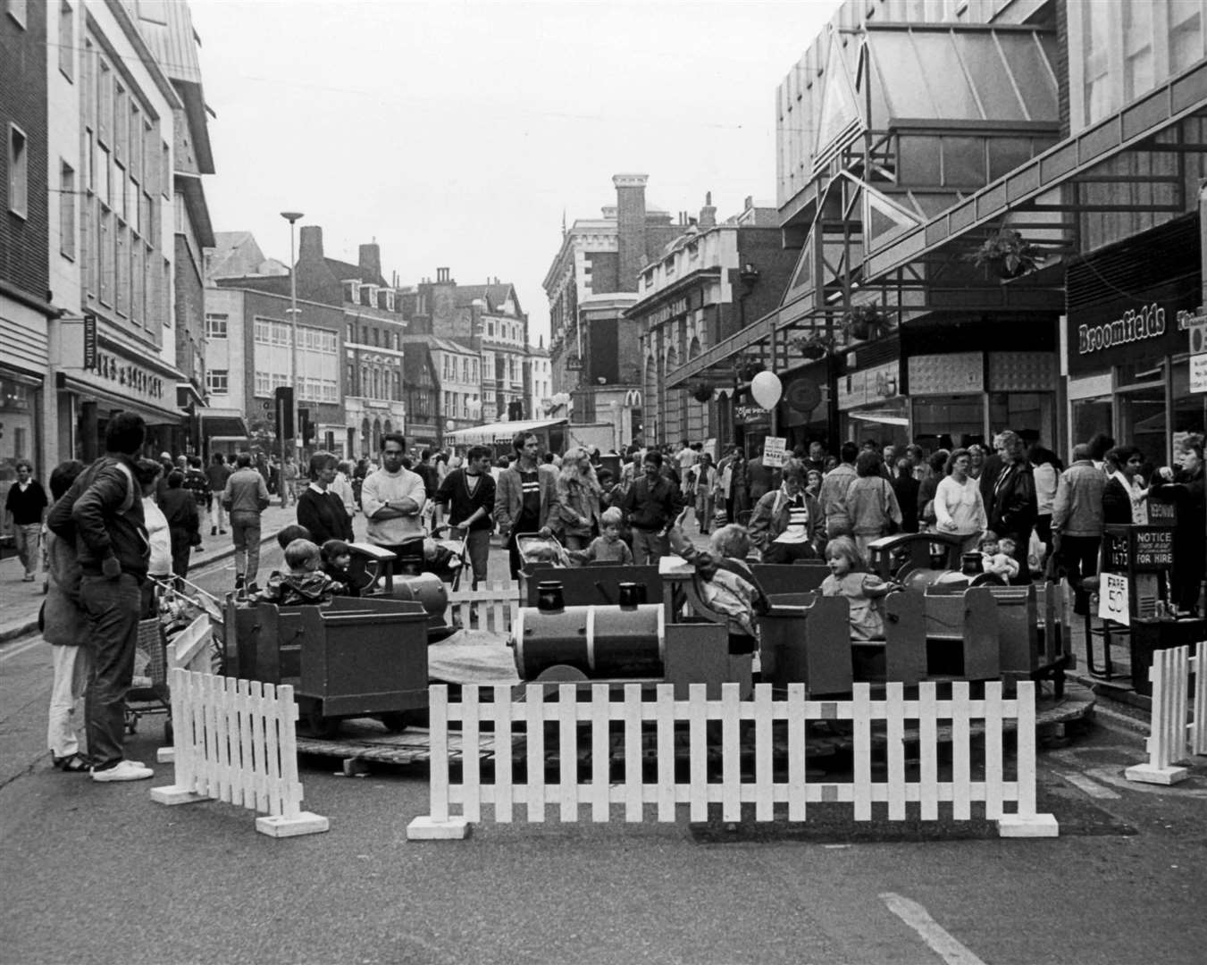 High Street, Gravesend, on October 31, 1990. Broomfields, seen on the right of this picture next to the entrance to the Thamesgate shopping centre in Gravesend, is now a Greggs. Further down, on the other side of the entrance, was an Our Price