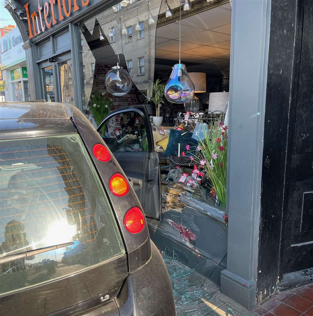 Interiors Direct owner Mark Tadman believes the crash has caused thousands of pounds of damage to his shop. Picture: Adam Ahmad