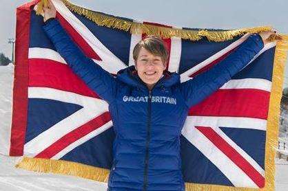 Yarnold carrying the flag at the Winter Olympics