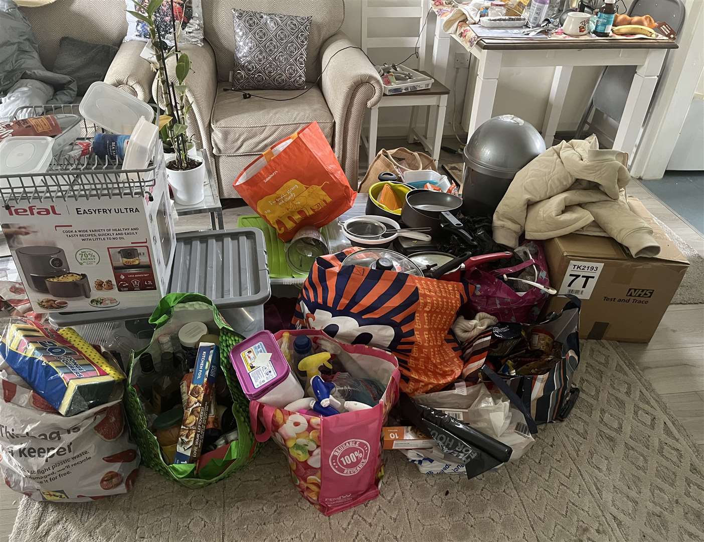 The contents of Barbara Hasiuk’s kitchen cupboards have been piled on her living room floor for three months