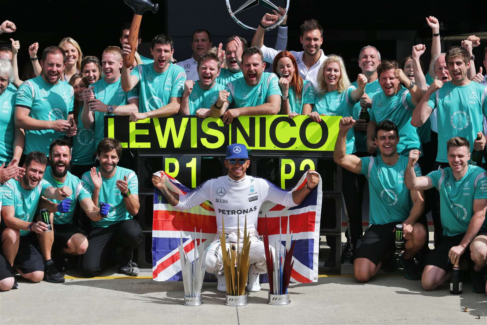 Lewis Hamilton and the Mercedes F1 team with the British Grand Prix trophies designed by Aford Awards. Picture: James Moy Photography Ltd