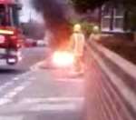 Dramatic picture as fire leaps through a manhole cover