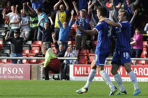 Joe Martin takes the applause after his stunning free-kick against Crewe on Saturday. Picture: Barry Goodwin