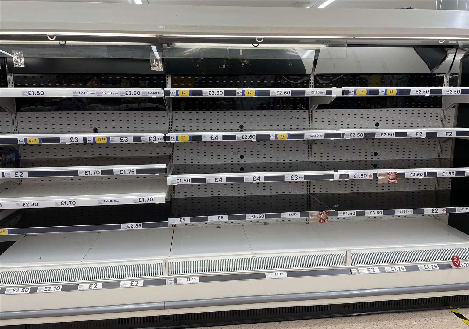 Empty shelves in the meat aisle of a branch of Tesco in Liverpool (Peter Byrne/PA)