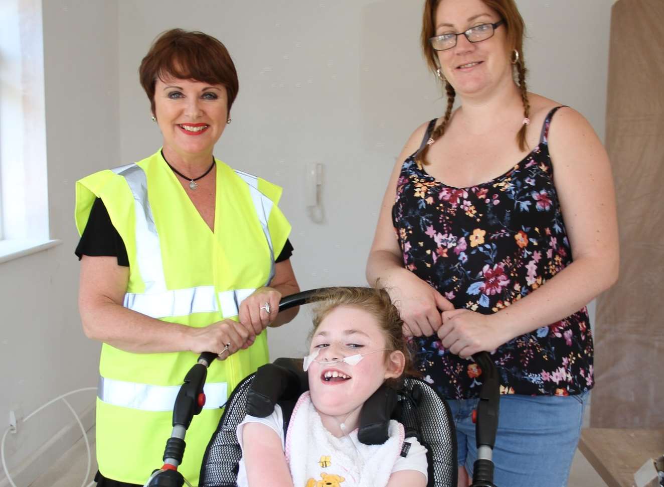 Ruby and mum Zoe, right, with Sharon Donald, housing strategy and development manager. Picture: Gravesham Borough Council
