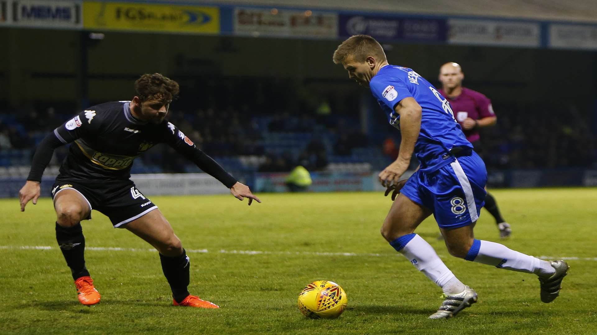 Jake Hessenthaler looks to unlock the Shakers' defence Picture: Andy Jones