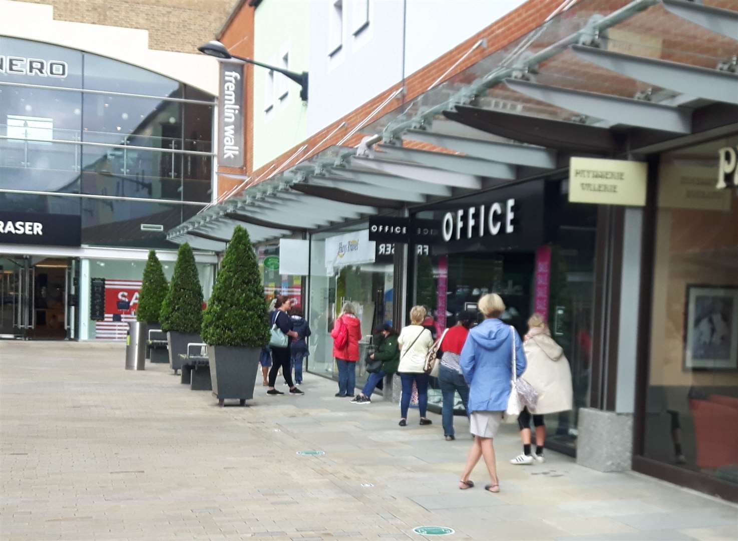 Shoppers queue outside Laura Ashley in Maidstone when it reopened for its closing down sale