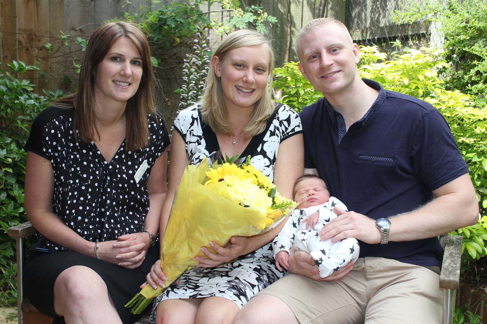 Janine Absalom, left, with mum Emma Baines, baby Alex, and proud father Mark Sloane