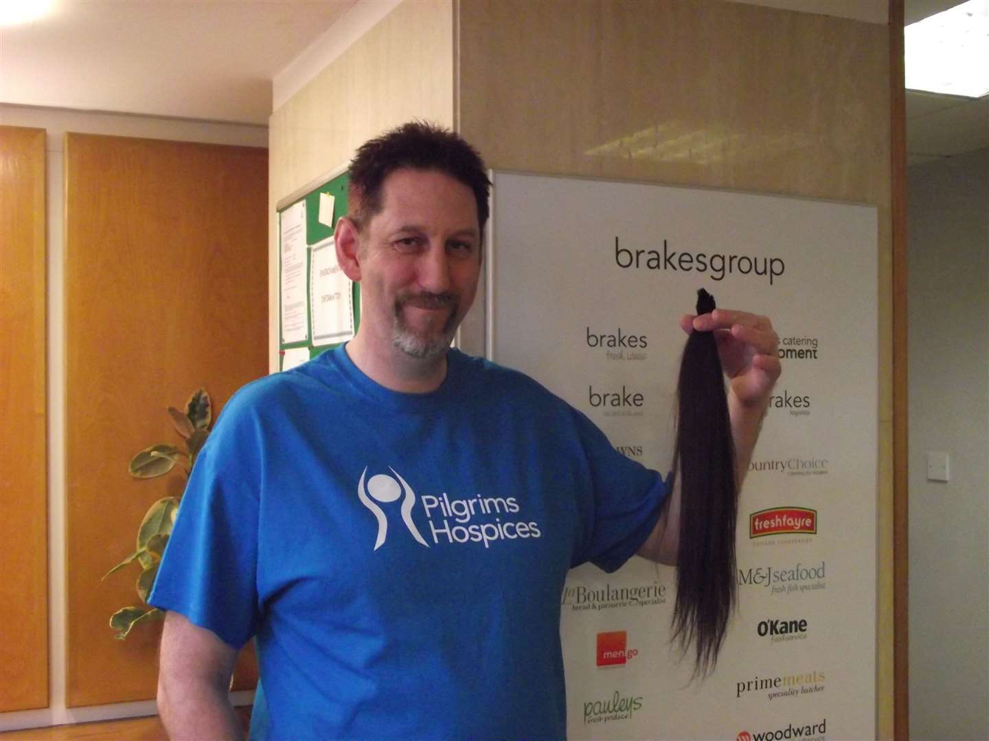 Daryn after having his hair cut for the Pilgrims Hospice in 2013