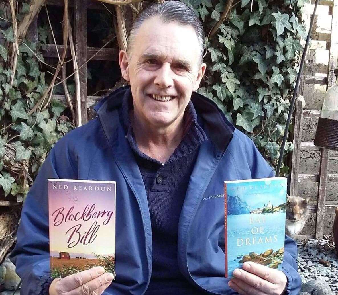 Author Ned Reardon with his new book Bay of Dreams and his first one Blackberry Bill