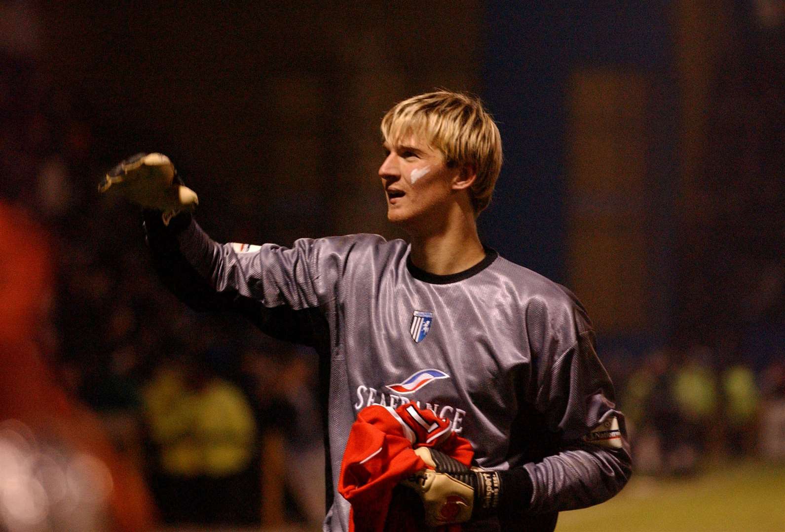 Gillingham's goalkeeper Bertrand Bossu celebrates at the end of the game against Charlton Athletic