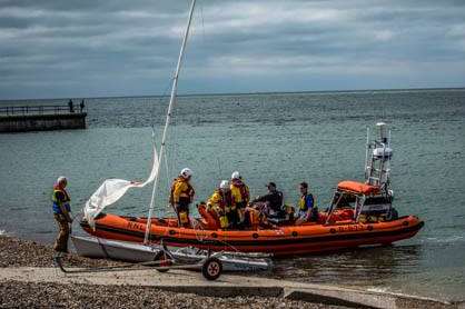 The lifeboat crews returned the men to the shore. Picture by Adrian Bennett