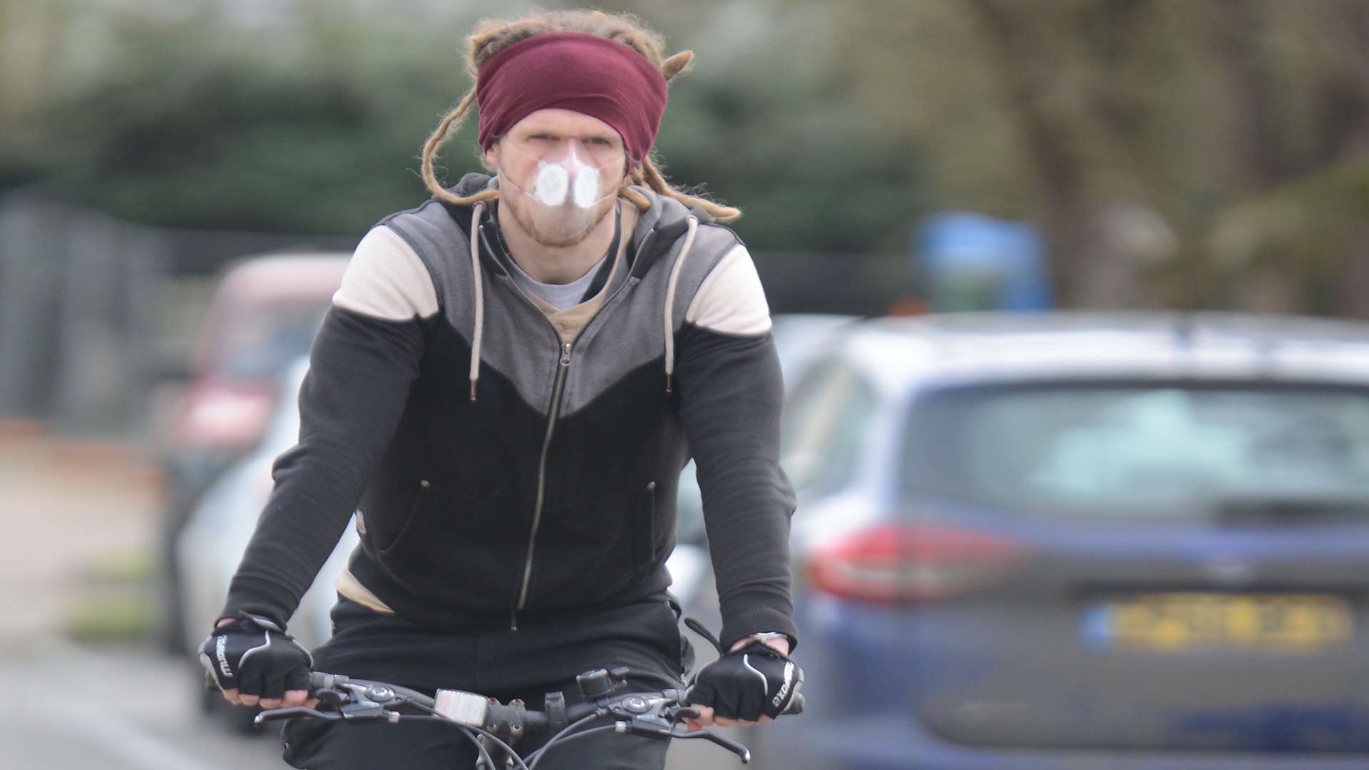 Cyclist Martin Baker wearing his anti-air pollution mask