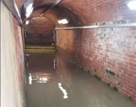 The water in the underpass at Herne Bay railway station was said to be knee deep. Picture: Tommy Teague