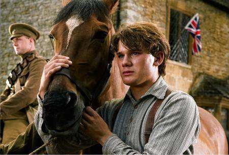 Albert (Jeremy Irvine) and his horse Joey in DreamWorks Pictures' War Horse