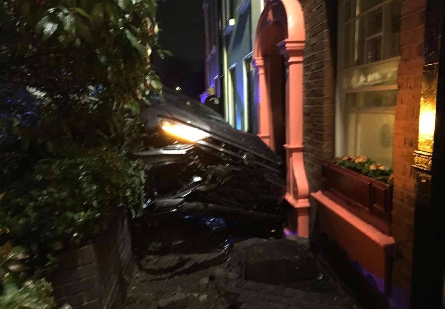 The car crashed in Greenhithe High Street after a police chase, narrowly missing a family. Picture: Peter Harman