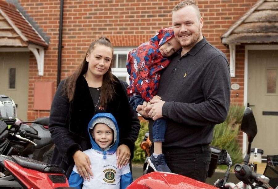 Ollie with his parents Lee and Fiona and brother Finley, who are setting up a charity in his name