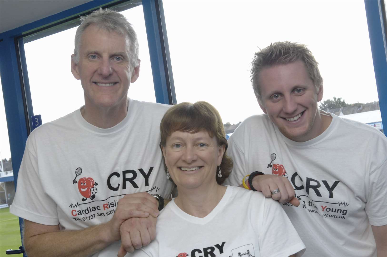 Roger and Janet Maddams alongside Jack's older brother, Rob, at a heart screening day at Gillingham Football Club in September 2011. Picture: Ruth Cuerden