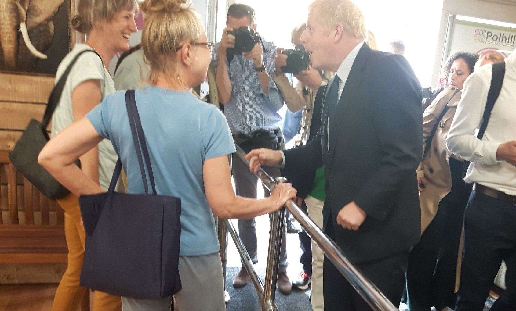 Boris Johnson meets garden centre customers in Sevenoaks (13227249)