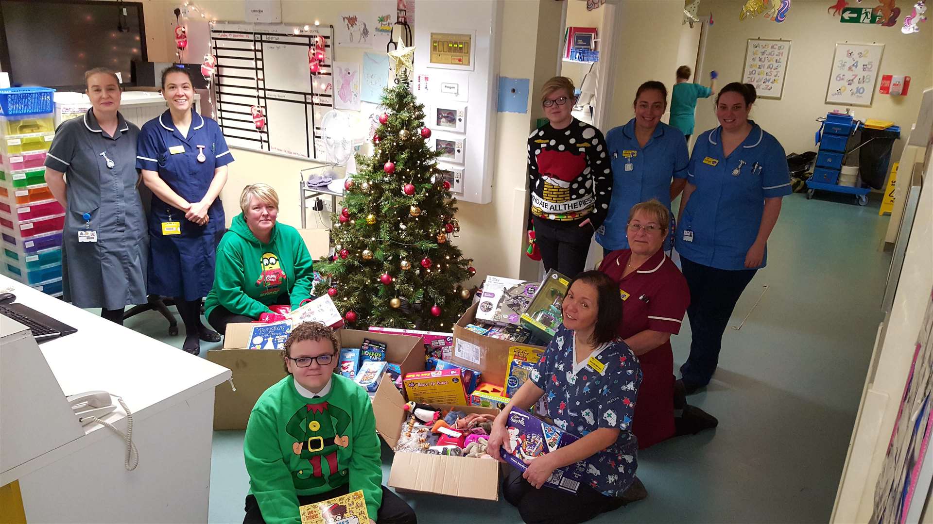 Oakley Orange (front left) presents gifts at Medway Maritome Hospital