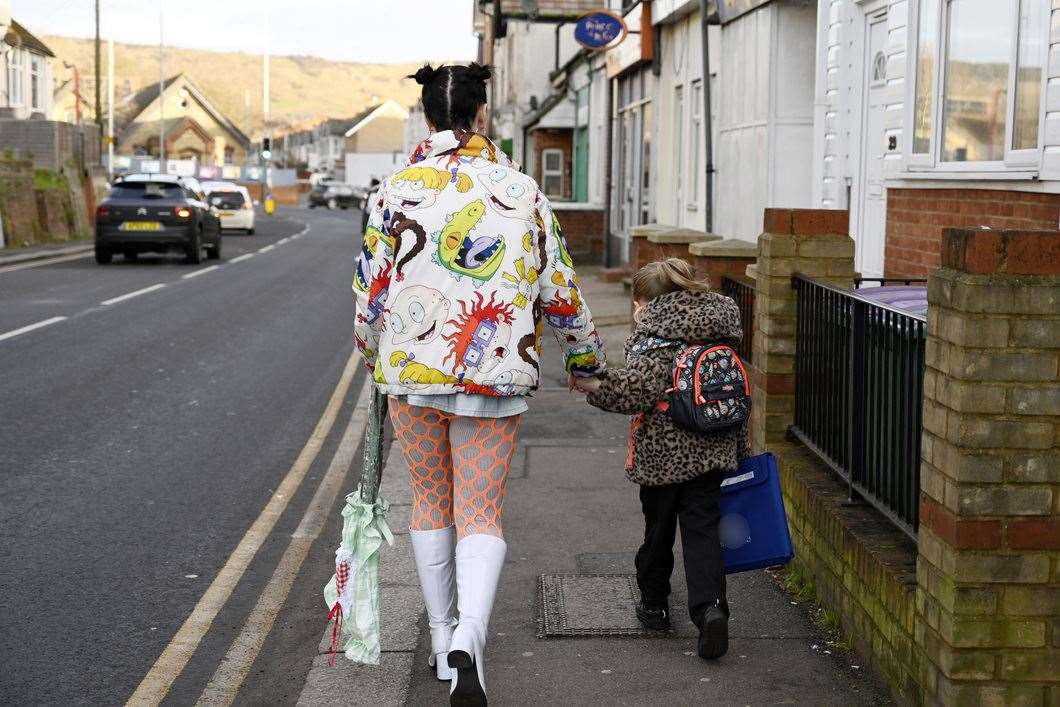 Charlie Hayes walks her son Jasper to school in Folkestone in eccentric outfits. Picture: Barry Goodwin