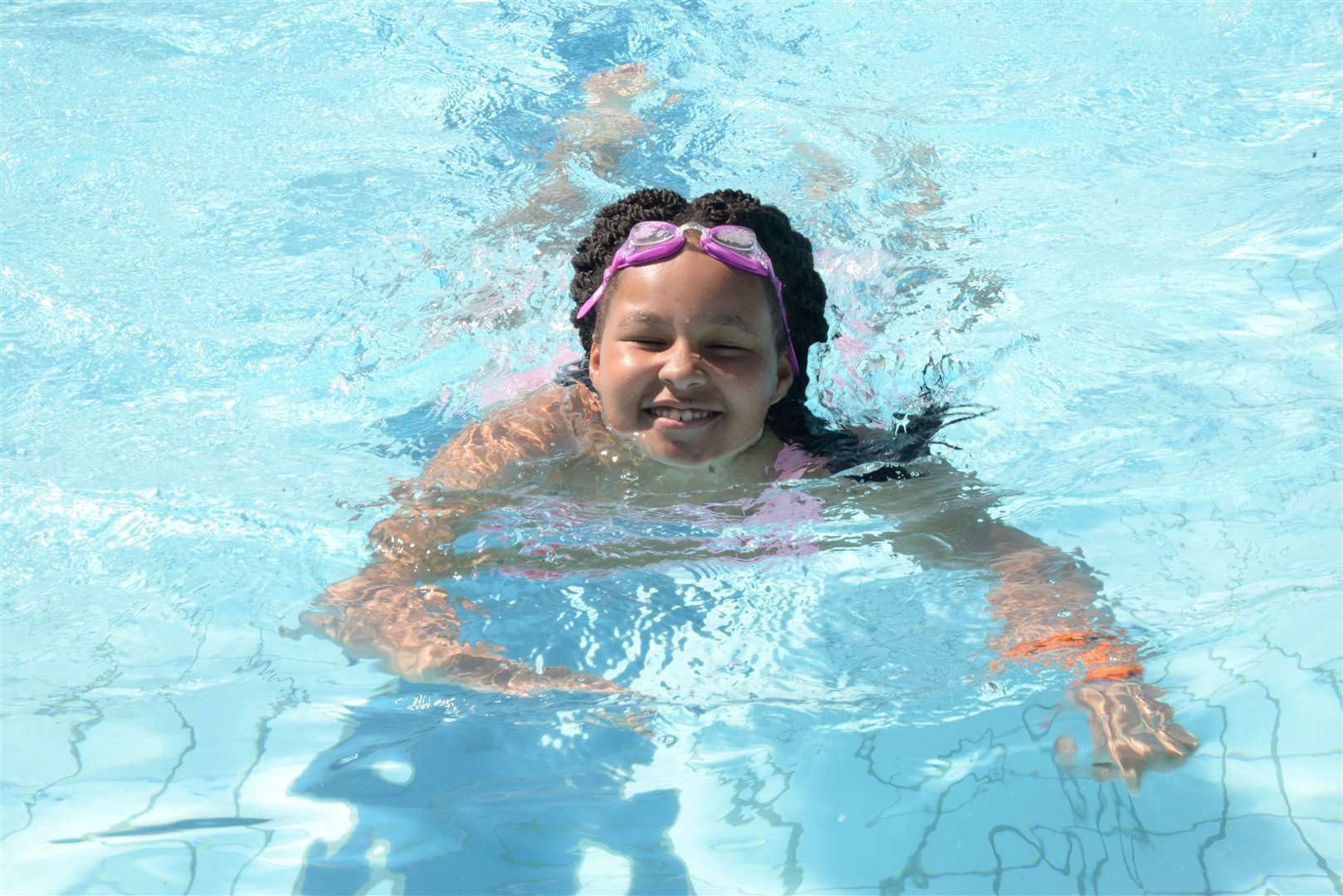 Blossom Fentiman, 10, enjoying a swim at the reopening of Faversham Pool last year