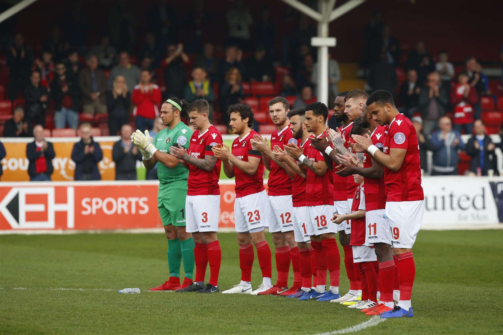 Ebbsfleet United hold a minute's applause for former player Mike Thalassitis before their game with Wrexham last Saturday